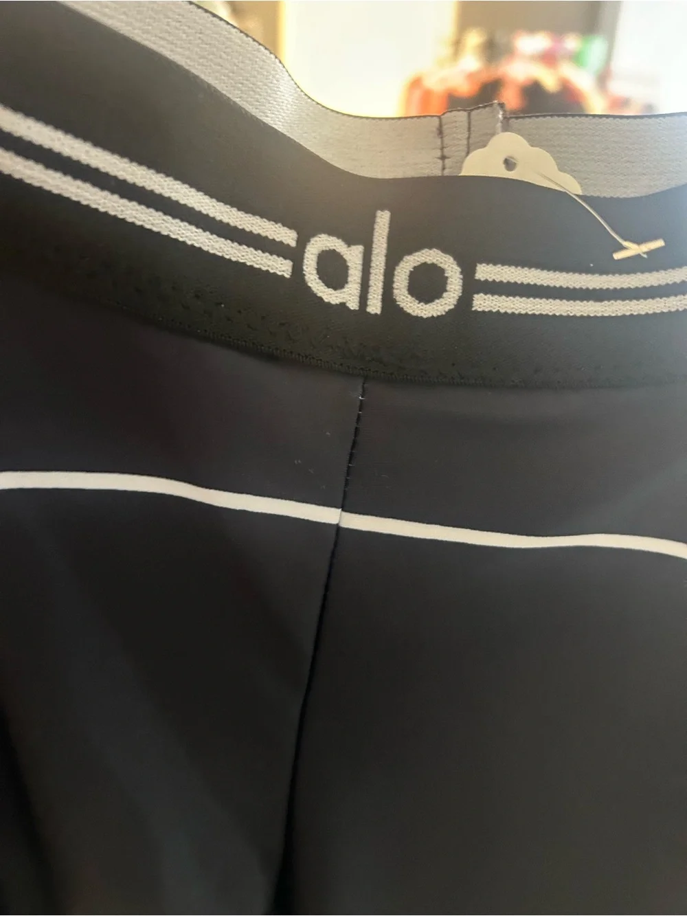 ALO Yoga Black Active Leggings with White Stripe Accents